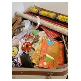 Suitcase of bags/ribbon/paper