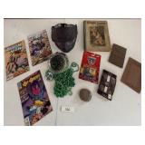 Books, comic books, beads, paintball helmet