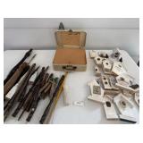 Wooden project pieces and small suitcase