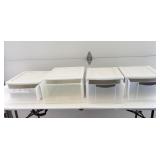 4 large plastic drawers, assorted sizes