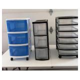 3 plastic drawer towers, 2 have wheels