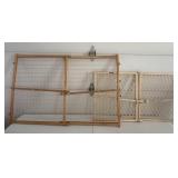 2 wooden pet or safety gates