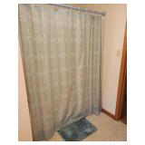 Teal shower curtain,  bath mat