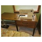 Singer sewing machine and cabinet