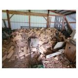 4+ ricks of firewood in large pile