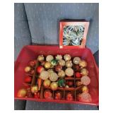 Tote of glass ornaments,