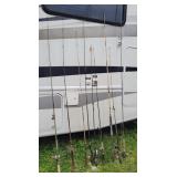 9 fishing poles & fly reel