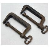2 Stearns metal clamps