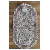 Oval braided rug