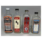 4 Embalming fluid bottles