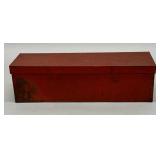 Tin box in old red paint