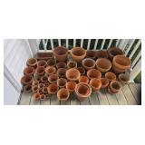 Red Clay Pots in Various Sizes