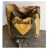 Bag of Sacrete & cast metal dolly