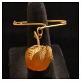 18K yellow gold & Baltic Amber? Apple pin