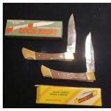 Wood handle pocket knives in boxes