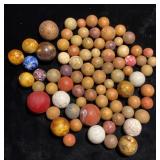 Clay and enameled marbles