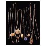 Gold tone necklaces & pendants