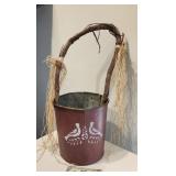 Galvanized bucket with grape vine handle