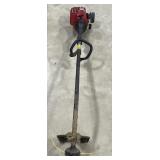 (V) 4 Cycle Weedwacker Approx. (60 in x 10 in)