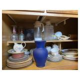 Contents of Cabinet: Plate Sets, Baking Dishes,