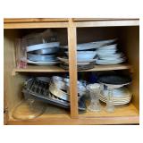 Contents of Cabinet: Plate Sets, Muffin Tins,