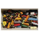 Bin w/ Toy Trucks, Model Trains, And Plastic