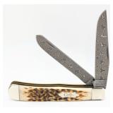 2007 Case XX Rain Drop Damascus Amber Bone Trapper