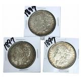 (3) 1897 United States Morgan Silver Dollars
