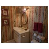 Contents Of Bathroom Include Towels, Framed Prints