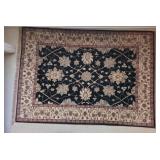 Black, Beige, And Red Sakkura Oriental Rug
