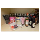 Contents Of Shelf: Mixers, Bar Tools, And More