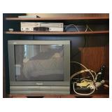 Contents Of Armoire - Panasonic CRT TV, GoVideo DV