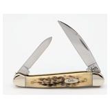 Ltd 2003 Case XX Amber Bone Wharncliffe Copperhead