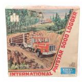 1/25 Ertl International Paystar 5000 Logger Semi T