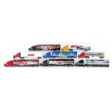 (8) 1/64 Ertl Semi Trucks and Trailers
