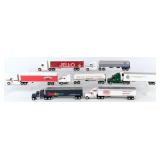 (7) 1/64 Ertl Semi Trucks and Trailers