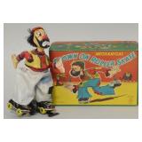 T.P.S Tin Litho Clown On Roller Skate In Box