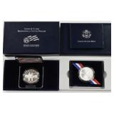 (2) 2004 Proof  & Unc Lewis & Clark Silver Dollars