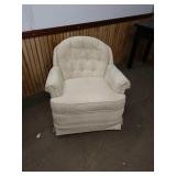 A white sitting chair