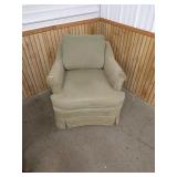 XX green sitting chair