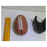Stress reducing squishy football with stand, a