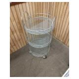 XX round glass drink cart 24 in tall by 15 in