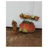 XX pumpkin wall decor in carved statue