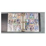 Binder of Football and Baseball Cards