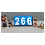 4  Figurines including M. Holcombe "Eli"