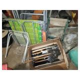 Outdoor camping lot lawn chairs and barbecue tools
