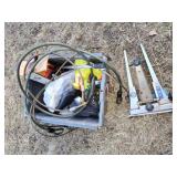 Tote of misc. bike parts and locking cabels