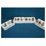 N Rockwell 12pc Celebration of Santa Ornament Set