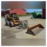 Case 95XT Skid Steer with forks and material bucket