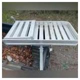 Aluminum tray cargo carrier with ramp